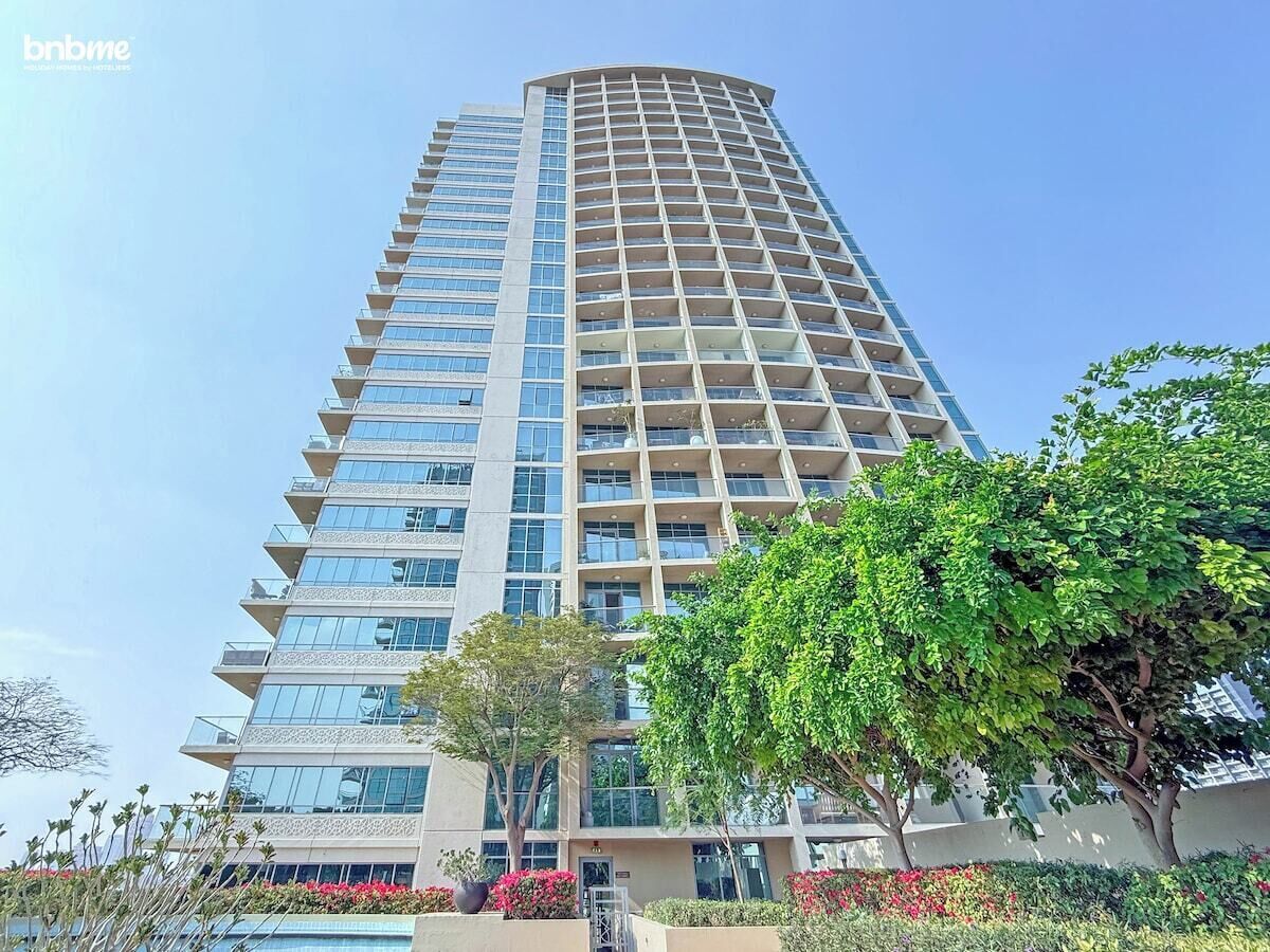 A beautifully designed building with sleek architecture and lush surroundings.
