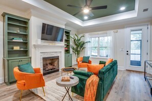 Smart TV, fireplace, books
