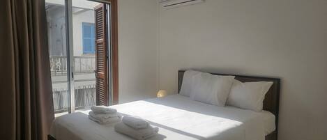 2 dormitorios, tabla de planchar con plancha, wifi gratis y ropa de cama