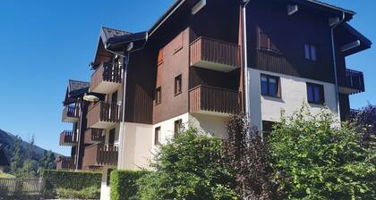 Charming mountain apartment with balcony.