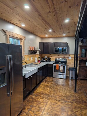 Microwave, oven, stovetop, dining tables