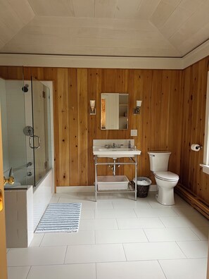 Shower, towels, soap, toilet paper