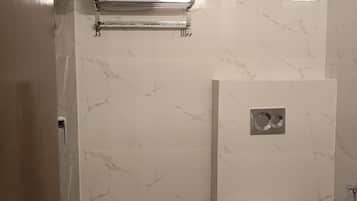 Comfort Room, City View | Bathroom | Shower, slippers, towels, soap