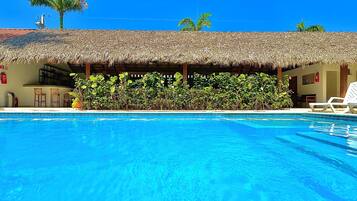 Outdoor pool, open 8:00 AM to 8:00 PM, pool umbrellas, sun loungers