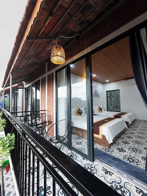 Family Room, 2 Queen Beds, Balcony | Desk, free WiFi