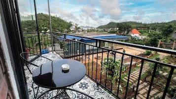 Family Room, 2 Queen Beds, Balcony | Terrace/patio