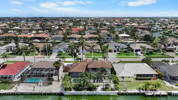 House, Multiple Beds (Beachy waterfront home with heated po) | Exterior