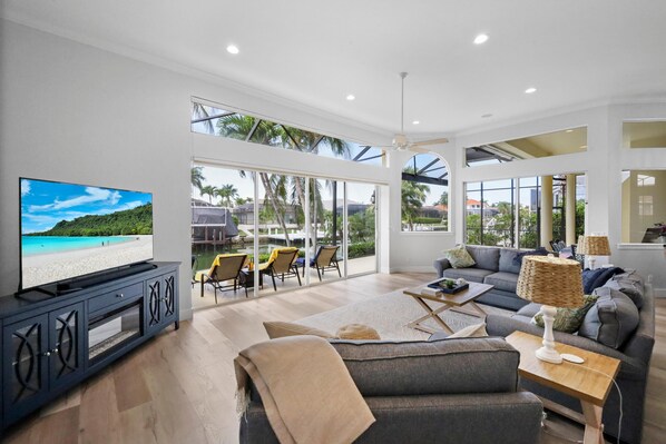 House, Multiple Beds (Beachy waterfront home with heated po) | Living area