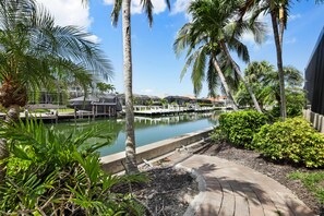 House, Multiple Beds (Beachy waterfront home with heated po) | Property grounds