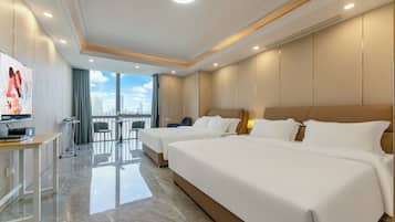 Executive Twin Room, City View | In-room safe, desk, laptop workspace, blackout curtains