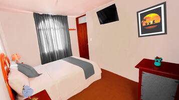 Quarto solteiro | Escrivaninha, espaço de trabalho para notebook, Wi-Fi de cortesia