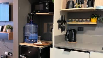 Mini-fridge, microwave, oven, stovetop