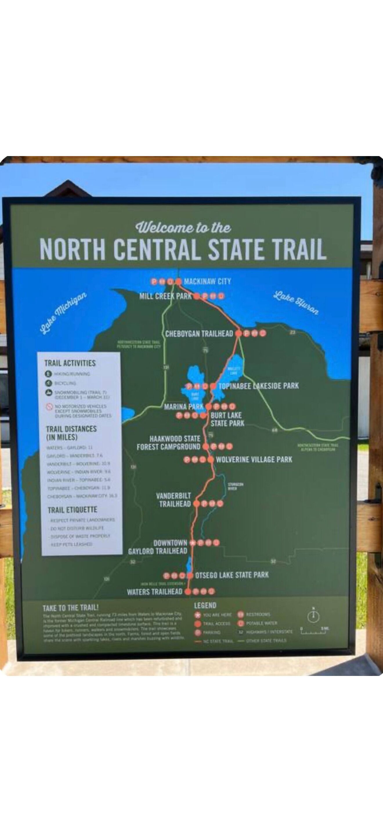 Kort over North Central State Trail, med angivelser af stier, aktiviteter og afstande.