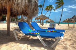 Private beach, white sand, beach cabanas, beach massages