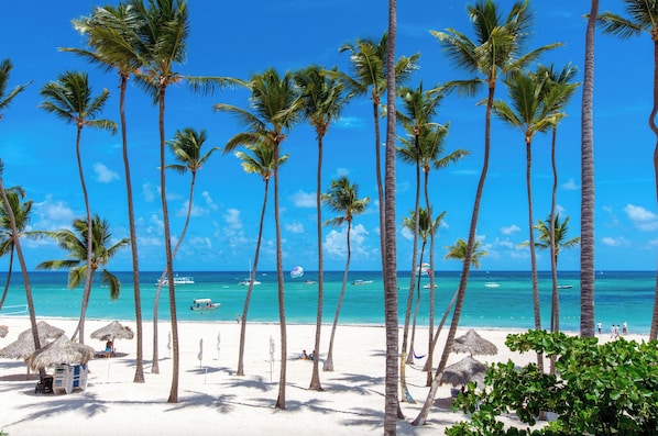 Private beach, white sand, beach cabanas, beach massages