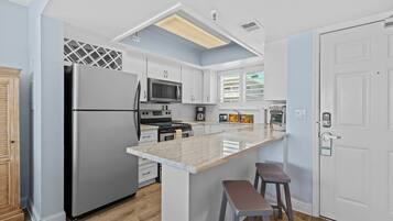 Condo, Multiple Beds, Balcony, Ocean View (Oceania Beach Club 301) | Private kitchen | Coffee/tea maker