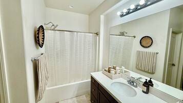 Hair dryer, towels, soap, toilet paper