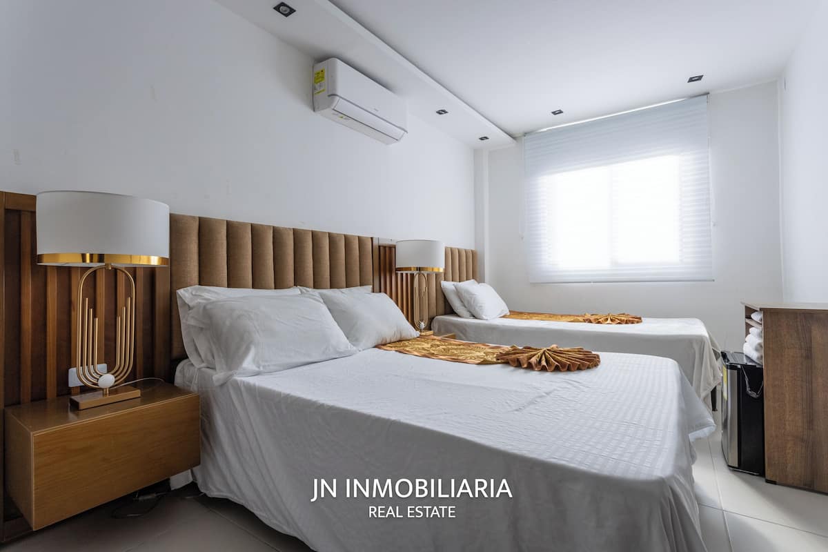 Luxury Quadruple Room, City View | In-room safe, laptop workspace, blackout drapes, free WiFi