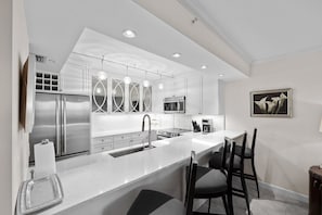 Coffee/tea maker, toaster, dining tables