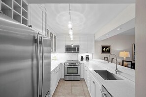 Coffee/tea maker, toaster, dining tables