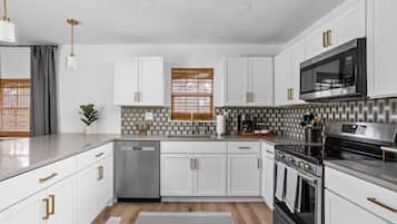 Refrigerador, microondas, horno y parrilla de estufa