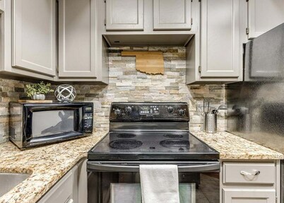 2-bedroom Wooded view condo in awesome NW OKC in Bluff creek. Entire condo