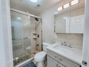 Shower, hair dryer, towels, soap
