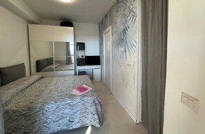 2 quartos, ferros/tábuas de passar roupa, Wi-Fi, roupa de cama