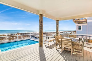 Outdoor dining - Lux Beachhome | 11BR | Sleeps 36 | Pool | Movies (Gulf Shores)
