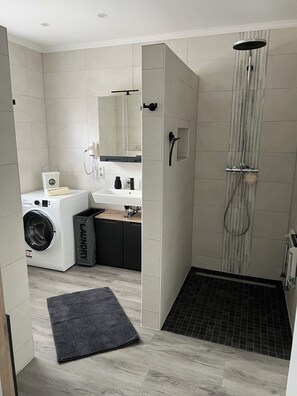 Hair dryer, towels, soap, toilet paper
