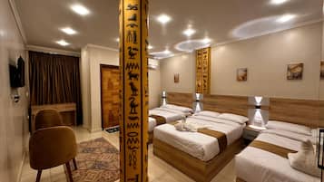 Superior Triple Room | Desk, blackout drapes, iron/ironing board, free WiFi