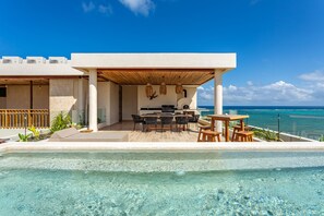 Outdoor dining - Exclusive Tulum Oceanfront Serenity | 3 BR | Pool (Tankah Cuatro)