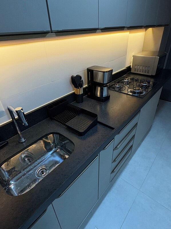 Apartment, 2 Bedrooms, Kitchen, Beachfront | Private kitchen | Fridge, microwave, stovetop, cookware/dishes/utensils