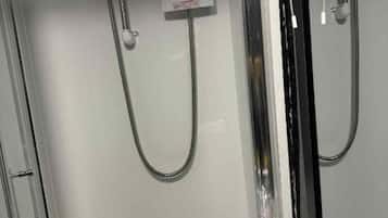 Standard Twin Room - Shared | Bathroom | Shower, hair dryer, towels