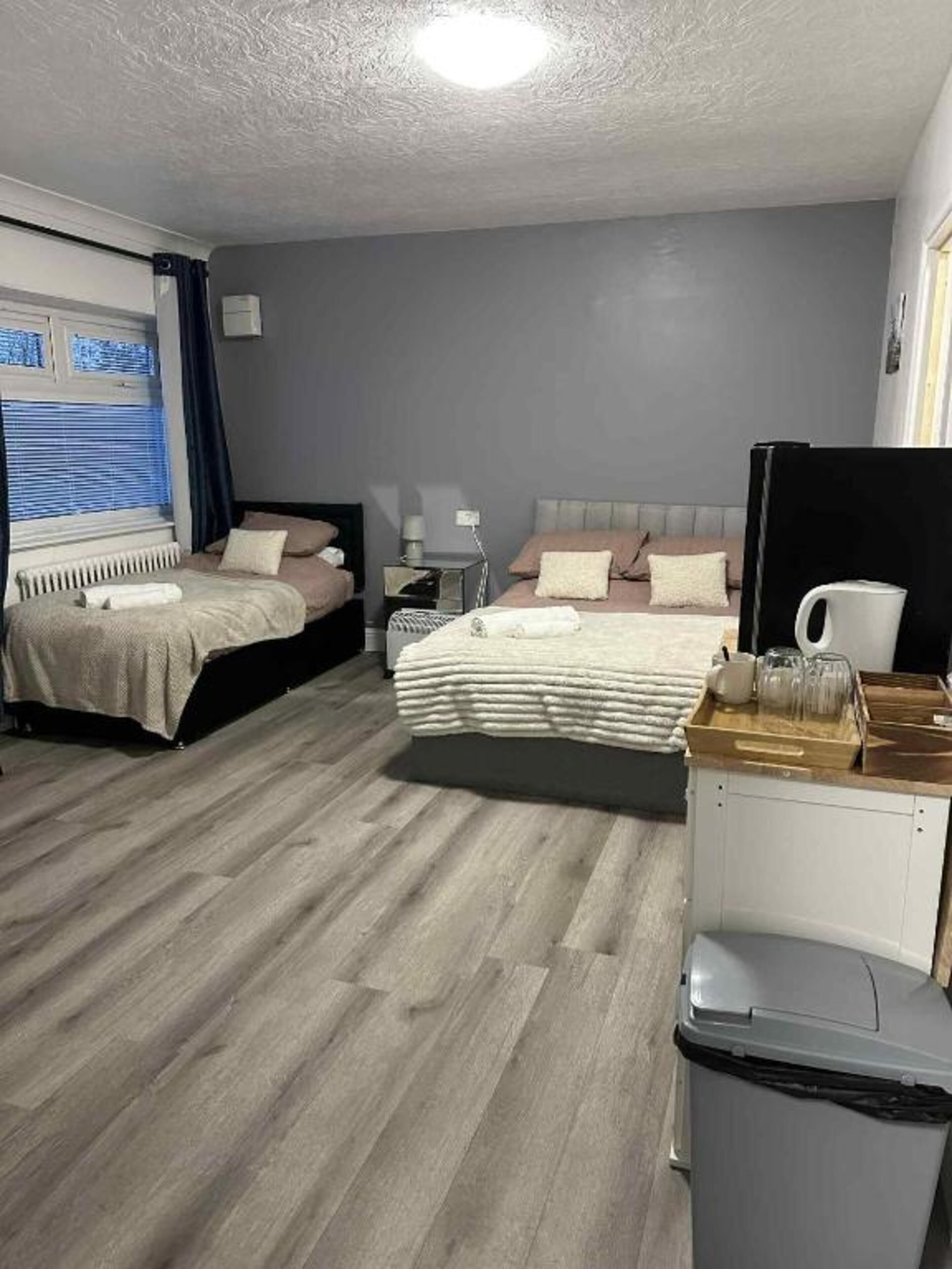 Standard Family of 3 Room | Een strijkplank/strijkijzer, gratis wifi, beddengoed