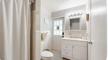 Hair dryer, towels, soap, toilet paper