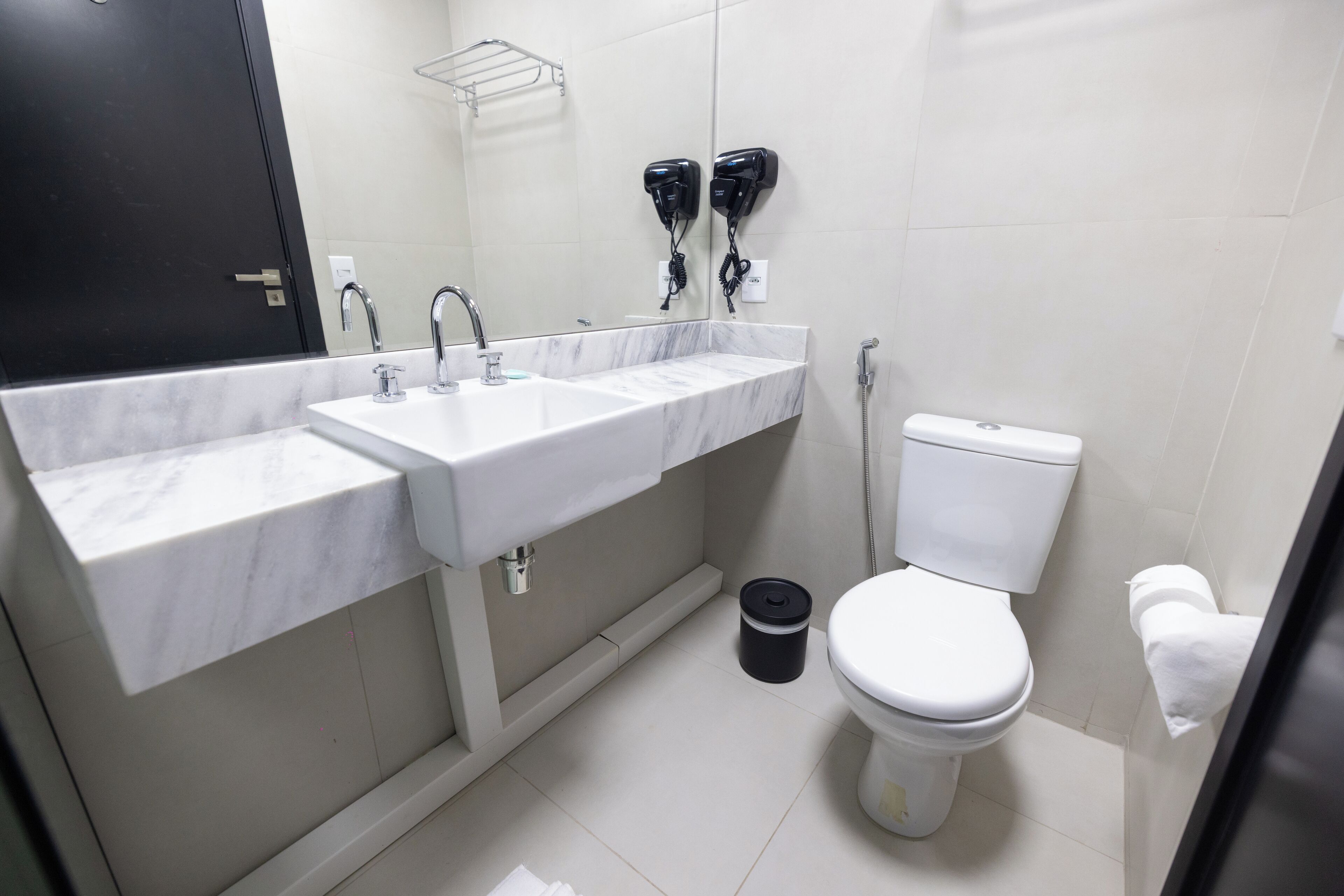 Shower, rainfall showerhead, hair dryer, towels