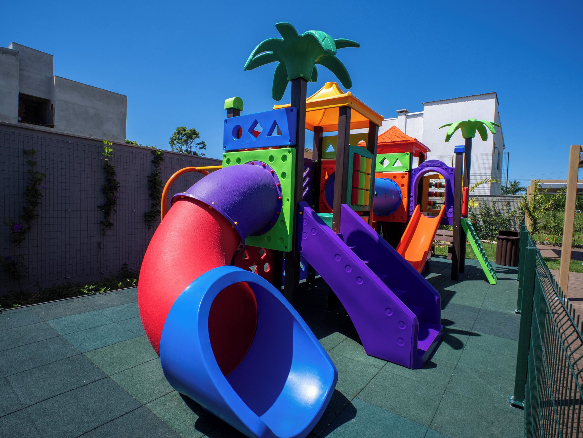 A playground with slides and climbing structures.