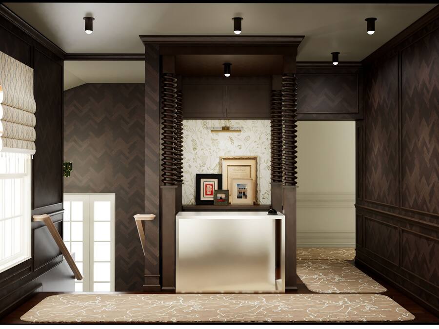 A reception area with a dark wood paneling, a reception desk, and framed pictures on the wall.