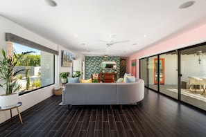 Smart TV, fireplace, books, offices