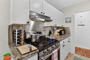 Fridge, microwave, oven, stovetop - 5BR Group House | Fire Pit, Movie Deck & Fun Games (Charleston)
