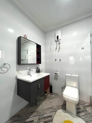 Shower, hair dryer, towels, soap