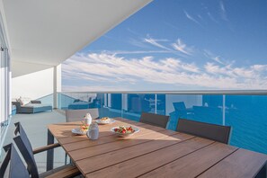 Outdoor dining - Luxurious Beachfront 2Bd Condo @ Encantame Towers Resort Best Beach in RP! (Playa Encanto)