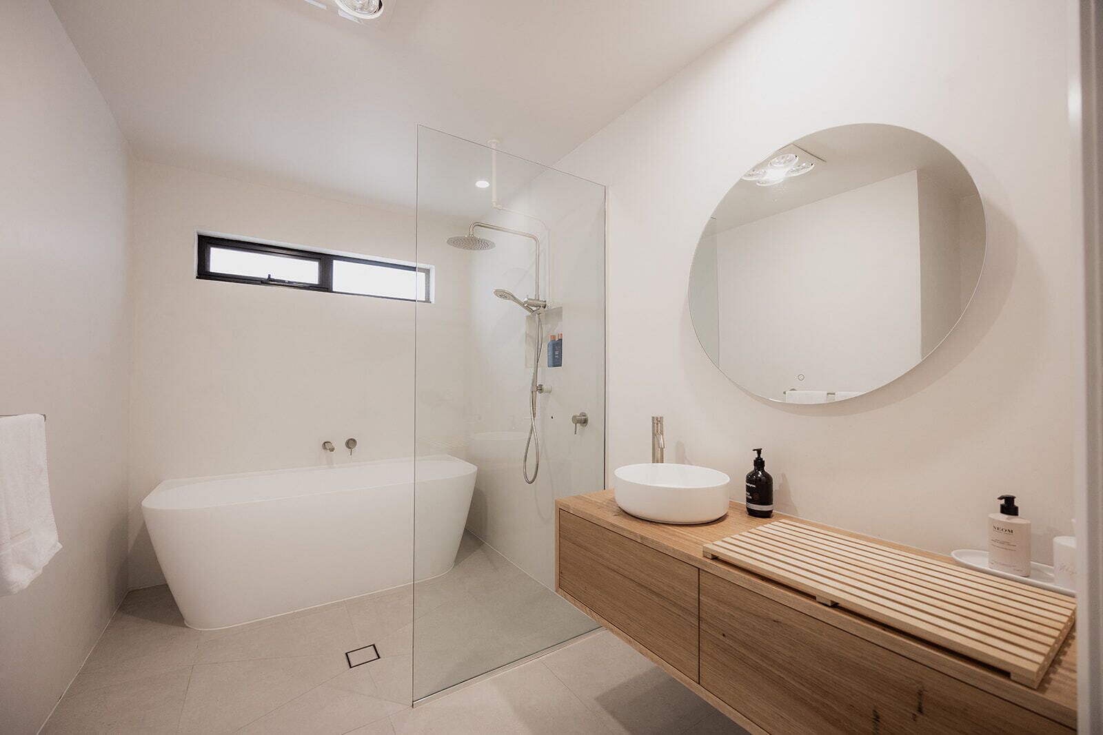 Shower, hair dryer, towels, shampoo