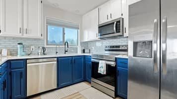 Deluxe Suite, Ocean View, Beachfront | Private kitchen | Fridge, microwave, espresso maker, eco-friendly cleaning products