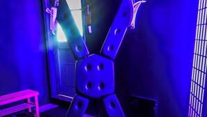 A room with a unique geometric light fixture, a door, and a small bench. - Adults Only - Cozy, Kinky Hideaway Perfect for Couples (Atlanta)