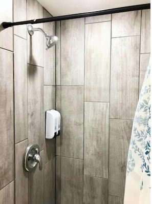Hair dryer, towels, soap, shampoo