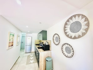 Fridge, oven, dishwasher, coffee/tea maker