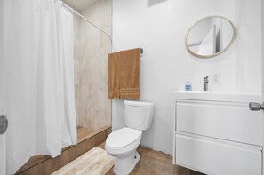 Hair dryer, towels, soap, toilet paper