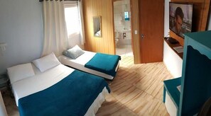 Standard Triple Room, Pool View | Laptop workspace, free WiFi